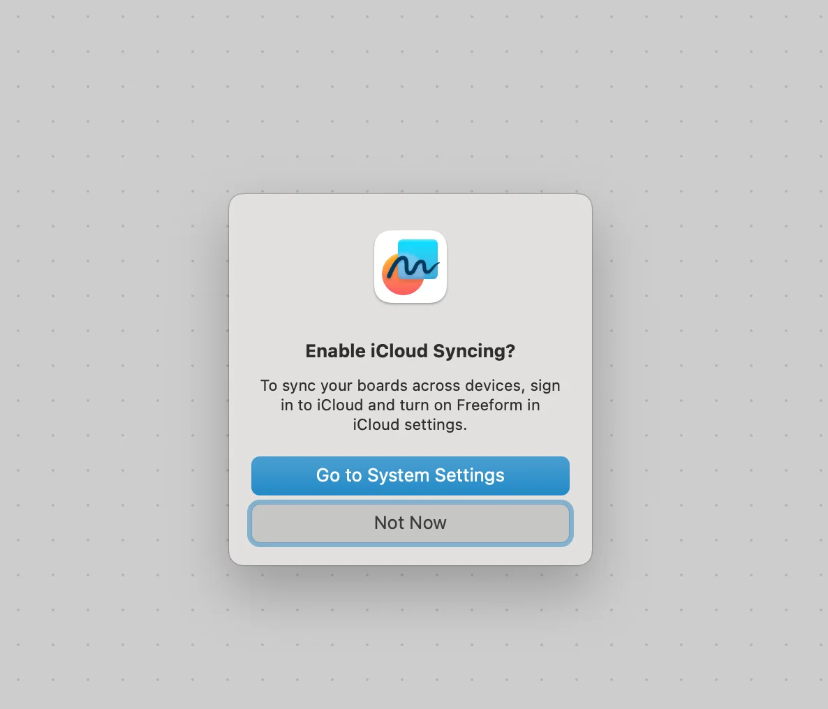 The image shows a dialogue box asking to enable iCloud Syncing. It suggests that to sync boards across devices, one should sign in to iCloud and turn on Freeform in iCloud settings. There are two buttons: "Go to System Settings" and "Not Now".